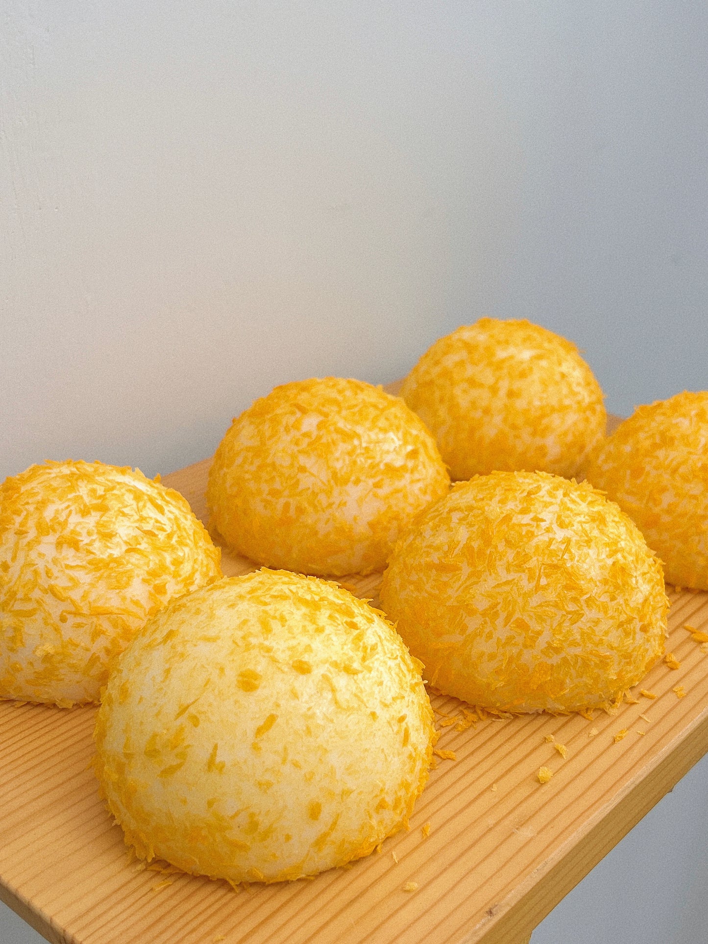 Golden Fried Mochi Bun Stress Toy - Squishy and Delightfully Realistic