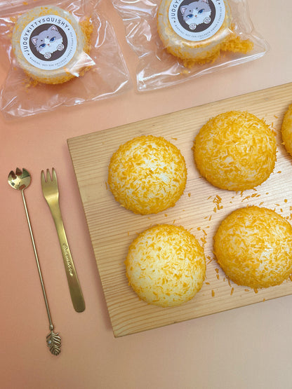 Golden Fried Mochi Bun Stress Toy - Squishy and Delightfully Realistic