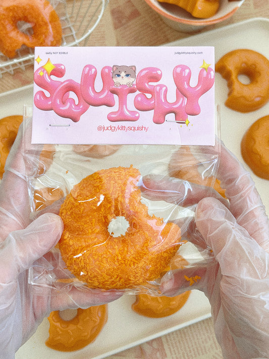 Judgy Kitty Bite-Sized Donut Squishy Toy - Stress Relief with a Dash of Sass