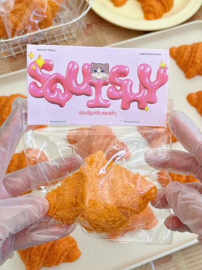 Judgy Kitty Fried Croissant Squishy Toy