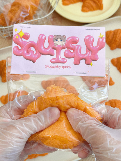 Judgy Kitty Fried Croissant Squishy Toy