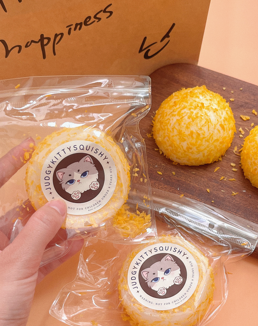 Golden Fried Mochi Bun Stress Toy - Squishy and Delightfully Realistic